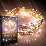 Starry Lights By Qualizzi®- 120 Warm White Led's on 20ft Ultra-Thin Copper Wire   FREE e-Book! - Amazingly Bright Led Christmas Lights Create Mesmerizing Hanging Garlands - Best Starry String Lights for Fairy Light Effects for Outdoor Patio Decorations.   110/220v Pw. Adaptor