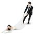 The Reluctant Bride Cake Topper is sure to add a humorous finish to any wedding cake! Made of polystone, the cake topper shows the groom dragging a stubborn bride down the aisle. A great conversation piece, it will make a great addition to any wedding cake.  Features:    Reluctant Bride Cake Topper  Adds a humorous finish to any wedding cake  Made of food safe polystone (non-edible)  Dimensions: H: 15.7cm x W: 6.4cm x D: 11.4cm