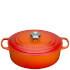 The Le Creuset Signature Oval Casserole Dish is ideal for cooking everyday meals for a family or when you are feeding a crowd. The large size casserole has a generous 6.3L capacity and is ideal for longer cuts of meat such as racks of ribs, legs of lamb and whole chickens as well as stews, slow-cooked meats, risottos and ragus.  The hard-wearing, chip-resistant enamel will keep its good looks for a lifetime and the sand coloured interior means that you can keep a close eye on your food throughout the cooking process. The impervious enamel will not absorb colours, flavours or odours so is also excellent for marinating and storing food.  Handcrafted in France from cast iron, the elegant oval design of Le Creuset?s casserole dish features wide handles for easy handling and is suitable for all hobs, including induction, in the oven, under the grill and safe for the using in the freezer and for cleaning in the dishwasher.  For more information on how to care for your Le Creuset product, click here.  Features:    Le Creuset Signature Oval Casserole Dish    Diameter: 31cm  Capacity: 6.3 L  Servings: 8   Oven/dishwasher/grill/freezer safe  Suitable for any kind of hob, including induction  Tight fitting stainless steel lid
