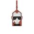 Orange vegan leather luggage tag from the Karl Around the World capsule collection by Karl Lagerfeld?s eponymous fashion label featuring a coloured silhouette of the iconic designer. Secured with a silver-tone buckled strap, the travel tag is complete with a clear panel and signature raised metallic Karl Lagerfeld branding. ? L.R.  100% PU