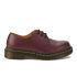 Dr. Martens Shoes in smooth cherry red leather with the classic 1461 design. The shoes feature a three eyelet laced upper and a chunky sole with contrast yellow stitching and a small heel. Made with a Goodyear welt, the upper and sole are heat-sealed and sewn together for durability. The classic comfort fit design is finished with a rounded toe and air-cushioned sole for comfort. - A.D.    Dr. Martens 1461 Shoes  Three eyelet design   Smooth cherry red leather  Air cushioned sole      Goodyear welt