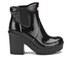 The women's original heeled gloss Chelsea boots from Hunter have been handcrafted from natural rubber with a gloss finish, and offer a comfortable fit with elasticated side gores. Set upon a chunky block heel, the waterproof boots feature a classic calendered sole and a cushioned collar for comfort. To retain an iconic silhouette, the shoes are complete with textured foxing, classic moustache detail at the toe and contrast Hunter logo to the front. - K.N.  Upper and Sole: Rubber. Lining: Textile