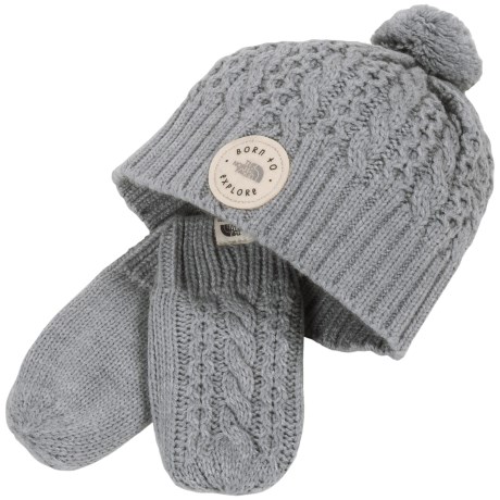 CLOSEOUTS . The North Faceand#39;s Minna beanie and mittens set is done in supersoft, chunky-knit acrylic for cute, cozy comfort. The thumb-less mittens are easy to get on squirmy little hands, and theyand#39;re lined in fluffy fleece for added warmth. The beanie features an adorable andquot;Born to Exploreandquot; patch and a darling pompom on top. Available Colors: COSMIC BLUE, TNF LIGHT GREY HEATHER, COY PINK. Sizes: 2XS, XS.