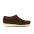 Men?s ?Wallabee? brown suede shoes from British heritage shoemakers Clarks Originals. Crafted with supple suede uppers, the shoes feature a flat lace-up fasten, narrow squared toe and tonal stitched detailing to the vamp and topline. Set on a robust crepe rubber sole, the ?Wallabee? shoes are complete with a cushioned insole and a suede Clarks Originals brand tab.  Upper: Suede. Sole: Rubber.