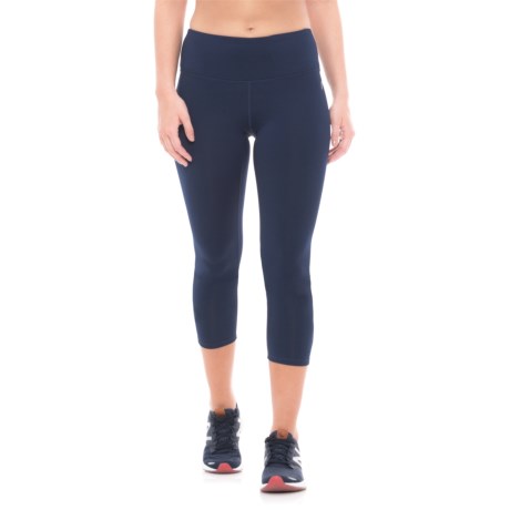 CLOSEOUTS . Headand#39;s solid crisscross capris let you move easily and comfortably no matter the workout thanks to their moisture-wicking, fast-drying Dri-Motionand#174; technical fibers and their four-way stretch construction. Available Colors: CHARCOAL HEATHER, BLACK, MEDIEVAL BLUE. Sizes: XS, S, M, L, XL.