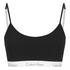 Women's CK One logo bralette from Calvin Klein. Crafted from breathable stretch cotton, the slip-on bralette features adjustable shoulder straps and a double-layer front for ultimate comfort. Complete with a branded elasticated band with signature Calvin Klein print. Unpadded.  92% Cotton, 8% Elastane