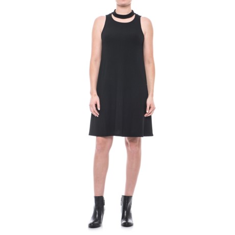 CLOSEOUTS . Upgrade your wardrobe with this X by Gottex choker neck A-line dress. Not only is the stretchy, ribbed fabric comfortable, itand#39;s simply designed with a swingy A-line silhouette for flirty fun, and completes the look with a choker neckline for fashion-forward style. Available Colors: BLACK, MARL HEATHER. Sizes: XS, S, M, L.
