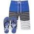 Men?s ?Shore? board shorts from Smith & Jones with a colour blocked blue and striped design. Fastened with an elasticated waistband with adjustable drawstrings, the knee-length swim shorts feature two side pockets, a single rear pocket with Velcro fastening and embroidered brand detail to the leg. The blue flip flops feature a classic black toe thong design while the textured foot bed is finished with signature white branding. ? A.D.  Shorts: Polyester. Flip Flops: Rubber.