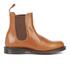 Dr. Martens ?Flora? brown leather Chelsea boots from the Kensington collection which updates classic silhouettes with styling refinement. Crafted with smooth aniline leather uppers, the Chelsea boots feature a classic construction with elasticated side gores, a round toe, and a leather pull tab to the heel. Set on a slim air-cushioned PVC sole with a classic Goodyear welt construction, the ?Flora? Chelsea boots are complete with signature Dr. Martens branding printed to the insole.  Upper: Leather. Sole: PVC.