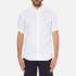 Classic white shirt from Tommy Hilfiger. Crafted from pure linen, the shirt comprises a button down collar, full front button placket and short sleeves with turned up cuffs. Featuring a plain back yoke and a curved hem. The classic shirt is complete with the signature Tommy Hilfiger flag embroidered to the chest.  100% Linen