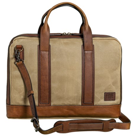 CLOSEOUTS . Keep papers and electronic devices organized and within easy reach with Fryeand#39;s Carter Slim briefcase. Itand#39;s handsomely crafted from durable waxed canvas for long-lasting use, embellished with leather handles and trim for sophisticated style, and features a plethora of pockets for holding the essentials. Available Colors: OLIVE, TAN, SLATE.
