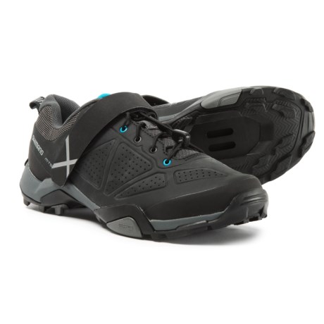 CLOSEOUTS . Thanks to a durable rubber outsole, a flexible EVA midsole and a rigid fiberglass-reinforced shank, Shimano SH-MT5 mountain bike shoes are an excellent choice for general mountain biking and touring. Available Colors: BLACK. Sizes: 40, 41, 42, 43, 44, 45, 46, 47, 48.