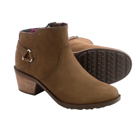 CLOSEOUTS . Tevaand#39;s Foxy boots: Because why drown in an intimidating sea of open shoe boxes, searching for the perfect ankle boots, when weand#39;ve found them for you? Gorgeously buffed nubuck shows off a decorative heel strap, interior-facing side zip and triangular metal bit detail, further sweetening the deal with a cushioned footbed and arch support inside. Available Colors: BISON, TAUPE, BLACK, BISCUIT. Sizes: 5, 5.5, 6, 6.5, 7, 7.5, 8, 8.5, 9, 9.5, 10, 11, 10.5.
