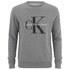 Men's 90's Re-Issue sweatshirt from Calvin Klein. Crafted from pure cotton, the grey jumper features a ribbed round neckline, long sleeves and dropped shoulders. Accentuated with contrasting Calvin Klein Jeans branding to the front and finished with a ribbed hem and cuffs. E.N.  100% Cotton