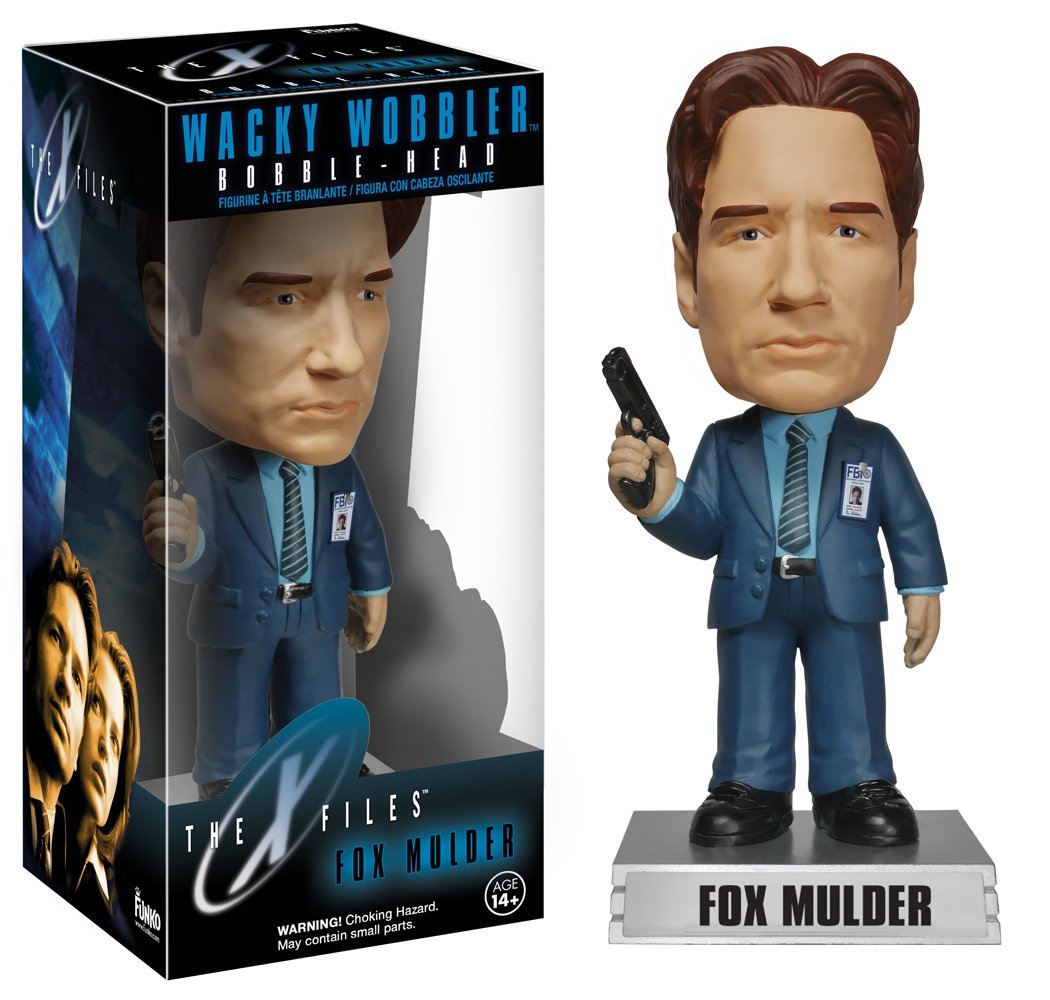 Do you want to believe? Well, this X-Files Fox Mulder Wacky Wobbler will make a believer out of you! This X-Files Fox Mulder Wacky Wobbler stands about 7-inches tall atop his name display base. Featuring the likeness of actor David Duchovny, this bobble head comes in a window display box. Fox Mulder is pictured in his black suit with a gun in his right hand and his F.B.I badge on his left chest. Trust no one, but do pick up this Fox Mulder Wacky Wobbler! Collect them all!