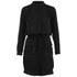 Women?s ?Geiko? black tunic dress from Munthe with tonal faux leather detail around the collar, pockets and cuffs. Fastened with a concealed button front closure, the lightweight dress is cut for a loose silhouette with pleats on the front and back. The front of the dress features a single breast patch pocket and two lower flap pockets with leather trim. Complete with a drawstring adjustable waist, buttoned cuffs and a drop back hem. ? A.D.  Main: Polyester. Trims: Faux Leather.