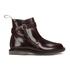 Dr. Martens Boots in high shine cherry red leather with a metal buckled closure and chunky outsole. Made with a Goodyear welt, the women's Teresa Jodphur boots feature a heat-sealed upper and sole that are sewn together for durability. The classic design is finished with a rounded toe, heel loop and a comfortable air-cushioned sole. - A.D.    Dr. Martens Women's Teresa Jodhpur Boots  Metal buckled closure  High shine cherry red leather  Leather lining  Air cushioned sole  Heel loop  Goodyear welt