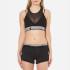 ?Build Me Up? mesh sports bra from the MINKPINK MOVE collection. Crafted from moisture-wicking stretch fabric with a form fitting mesh overlay, the crop top comprises a crew neckline and cut out racer back with crossover straps. Finished with an elasticated waistband and contrast MINKPINK branding.     88% Polyester, 12% Elastane Model is 175cm/5'9  and wears a size S.