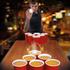 If you have mastered the standard game of beer pong and practised and honed your skills you might be ready to upgrade to XXL Giant Beer Pong. The set includes 12 x 1 Litre red cups, two giant ping pong balls and full gameplay instructions. Arrange the cups into a 10 or 6 cup triangle and fill, or half fill, with beer - the choice is yours! Gameplay involves throwing the ping pong balls into the cups and opponents must drink the contents of the cup into which the ball lands. A great drinking game probably best played in a sunny garden!  Features:      Giant Beer Pong XXL  Set includes 12 x 1 Litre red cups, two giant ping pong balls and full gameplay instructions  A great drinking game probably best played in a sunny garden!