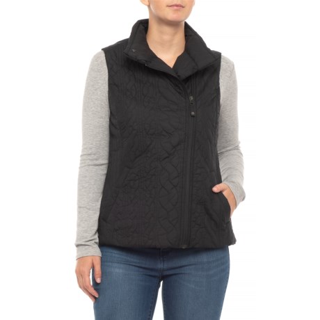 CLOSEOUTS . This cozy Royal Robbins Kaybelle vest warms and flatters the core with its heat-trapping synthetic insulation and quilted polyester upper with elegant cable stitch and rib patterning. Available Colors: JET BLACK. Sizes: XS, S, M, L, XL.