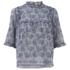 ?Esmeralda? top from Vanessa Bruno?s Athé collection. Crafted from pure cotton, the blouse features a frilled stand up collar, ¾ length sleeves with frilled trim and a keyhole with button fasten to the reverse. Complete with frilled chest panel and floral print throughout.  100% Cotton