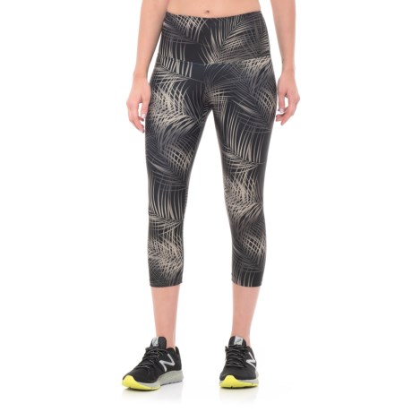 CLOSEOUTS . USA-made of stretchy, moisture-wicking polyester, Nuxand#39;s      Madrid High Waist leggings are all-season bottoms ready to pair with your favorite sports bra and tank for a comfortable yoga or heart-pumping cardio session. Available Colors: BLACK/COPPER, GEO/BLACK, WHITE/GOLD, BATIK/HI TECH, LINEAR STORM/BLACK, SNAKESKIN, WHITE LINES. Sizes: XS, S, M, L, XL.
